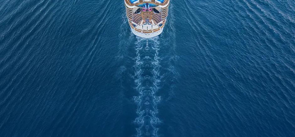 Cruise ship sailing on open blue water